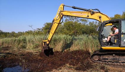 Floating digger provides next stage of fen restoration