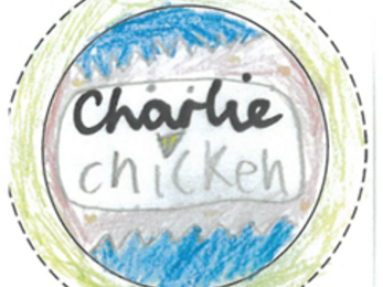 A coloured pencil drawing of a name badge by a school child that says, 'Charlie Chicken'.