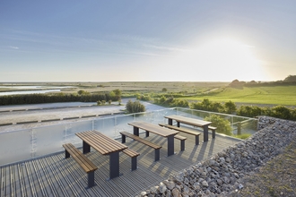 Benches outside Cley visitor centre.