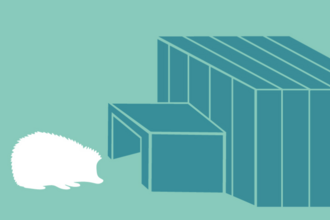 A silhouette of a hedgehog and a wooden hedgehog home