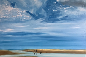 Beach scene with large stormy sky