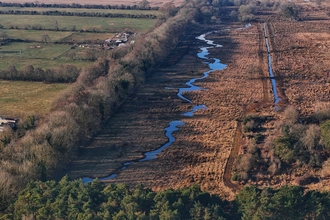 A meandering river at Grimston Warren.