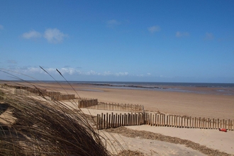 A view across Holme beach from the dunes