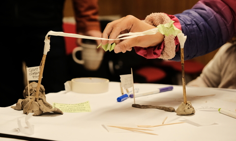 Locals are looking at mini sculpture designs of Sweet Briar marshes