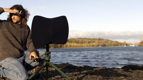 Picture of ornithologist Sean Ronayne recording birdsong