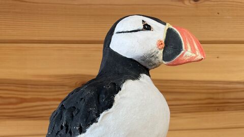 Top half of a ceramic puffin