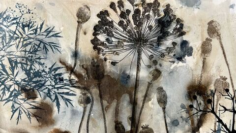 Artwork using seedheads, watercolours and printing on a pale background