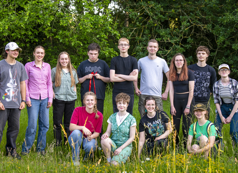 A group photo of our youth forum, posing at Sloughbottom Meadows. 